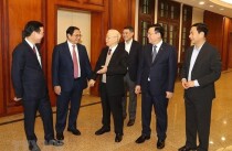 Tổng Bí thư Nguyễn Phú Trọng với các đồng chí lãnh đạo Đảng, Nhà nước dự hội nghị. (Ảnh: Trí Dũng/TTXVN)