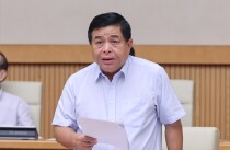 Bộ trưởng Bộ Kế hoạch và Đầu tư Nguyễn Chí Dũng báo cáo tại phiên họp. Ảnh: VGP/Nhật Bắc
