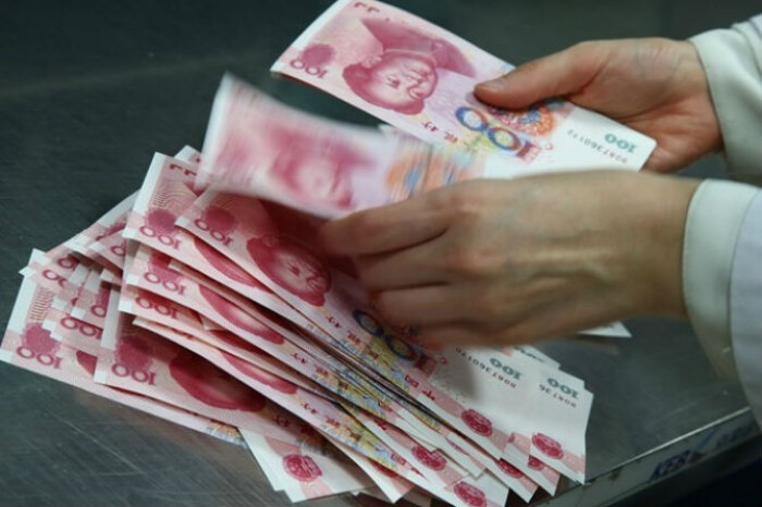 Trung Quốc cấm 3 ngân hàng ngoại kinh doanh đồng tệ xuyên biên giới