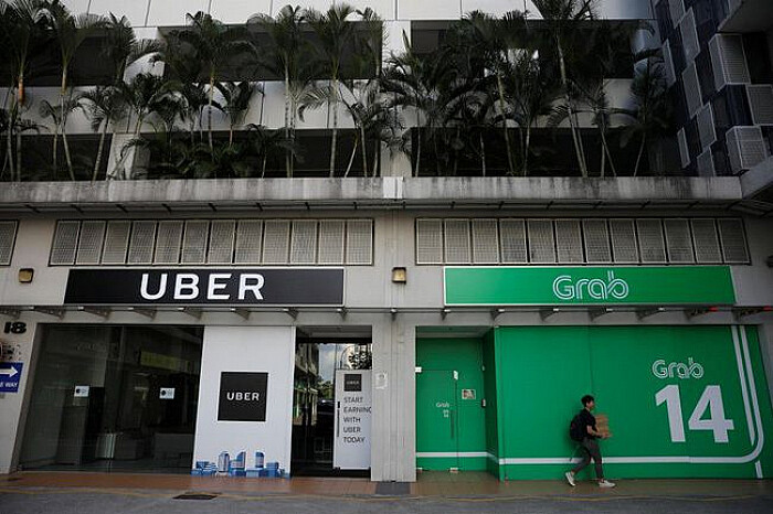 Vì sao các nước xử phạt còn Việt Nam lại tuyên Grab 'vô tội' trong vụ thâu tóm Uber?